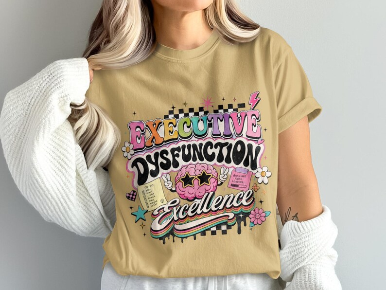 T-shirt with "Executive Dysfunction Excellence" in colorful text and graphic elements.
