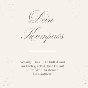 May include: A light beige card with the words "Dein Kompass" in elegant script. Below, the text reads, "Solange Du zu Dir hältst und an Dich glaubst, bist Du auf dem Weg zu deiner Gesundheit." The Menas logo is at the bottom.