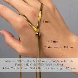 Detailed product sizing image of gold adjustable bolo tie necklace showing 3 mm snake chain width, 7 mm slider bead, and 120 cm total chain length. Waterproof stainless steel jewelry with 18K gold PVD plating, minimalist women’s necklace, long lariat Y necklace, modern statement piece, versatile everyday accessory.