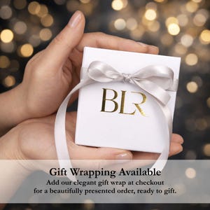 Luxury Baliore gift wrapping presentation with elegant white jewelry box, satin ribbon bow, and premium branding. Optional gift wrap for women’s jewelry orders, beautifully packaged necklace gift, sophisticated presentation for birthdays, anniversaries, holidays, or thoughtful minimalist jewelry gifting experience.