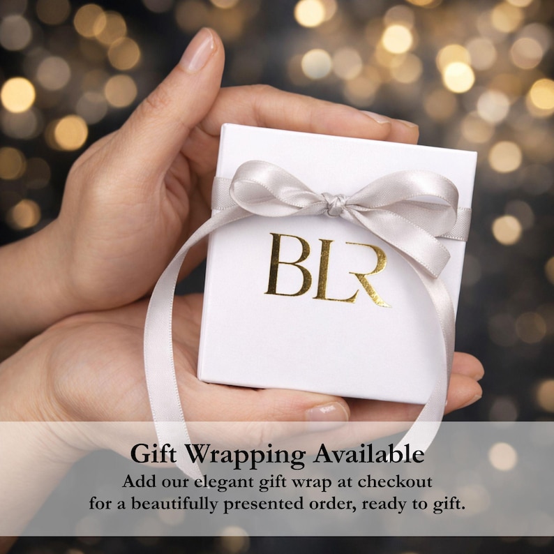 Luxury Baliore gift wrapping presentation with elegant white jewelry box, satin ribbon bow, and premium branding. Optional gift wrap for women’s jewelry orders, beautifully packaged necklace gift, sophisticated presentation for birthdays, anniversaries, holidays, or thoughtful minimalist jewelry gifting experience.