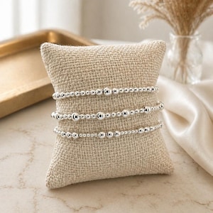 Stapelset sterlingzilveren kralenarmbanden