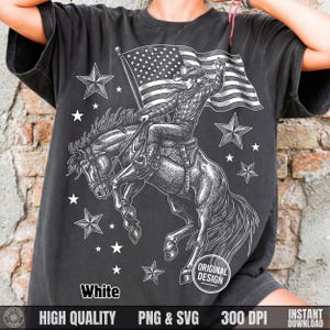 May include: A dark gray t-shirt featuring a detailed black and white illustration of a cowboy riding a bucking horse while holding an American flag. The design includes stars and the word "White". The shirt also has the words "HIGH QUALITY", "PNG & SVG", "300 DPI", and "INSTANT DOWNLOAD".