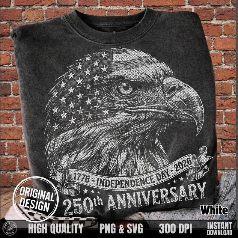 Folded dark grey acid wash t-shirt showcasing the white hand-drawn style eagle Independence Day graphic