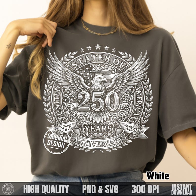 Woman wearing a dark grey t-shirt with a white vintage halftone United States of America 250 years anniversary bald eagle graphic.