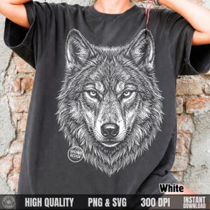 May include: Dark gray t-shirt featuring a detailed white illustration of a wolf's face. The design includes the text "ORIGINAL DESIGN" in a circle. The bottom of the shirt displays the words "HIGH QUALITY", "PNG & SVG", "300 DPI", and "INSTANT DOWNLOAD".