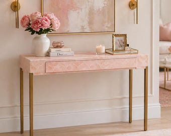 Mesa consola rosa palo con incrustaciones de hueso y un cajón, estilo moderno para recibidor.