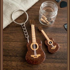 May include: A set of three ceramic mugs with a speckled, matte finish. The mugs are in shades of cream, light gray, and dark gray. Each mug has a simple, minimalist design, perfect for coffee or tea.