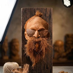 May include: A set of three ceramic mugs with a speckled, matte finish. The mugs are in shades of cream, light gray, and dark gray. Each mug has a simple, minimalist design and a rounded handle.