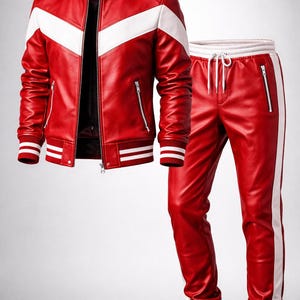 May include: A red leather jacket and matching pants set. The jacket features a white chevron design across the chest and white stripes on the sleeves. The pants have a white stripe down the side. Both pieces have zipper details.