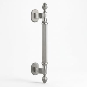 May include: A brushed nickel door pull with a vertical, fluted design. The handle features decorative finials at the top and bottom, and mounting plates on each end. The hardware is designed for a classic or traditional aesthetic.