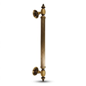 May include: A bronze door pull with a vertical, fluted design. The handle has decorative finials at the top and bottom, and circular mounting plates. The hardware has an antique finish, suitable for interior or exterior doors.