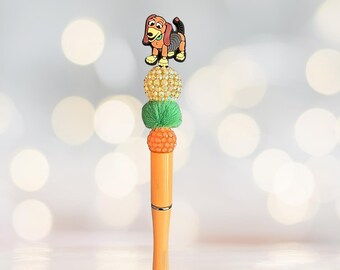 Bolígrafo de cuentas con adorno inspirado en Toy Story de Disney - Slinky Dog