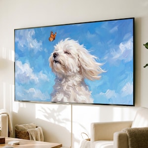 May include: A large rectangular wall-mounted television displaying a digital painting of a fluffy white dog with closed eyes and wind-swept fur, positioned against a bright blue sky with white clouds and a small orange butterfly hovering above.