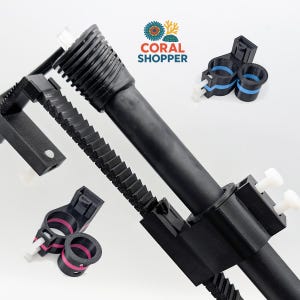 May include: A black plastic aquarium accessory featuring a long tube with a ribbed end, a serrated track, and mounting brackets with white screws. Two smaller black circular clips with blue or pink inner rings are displayed separately.