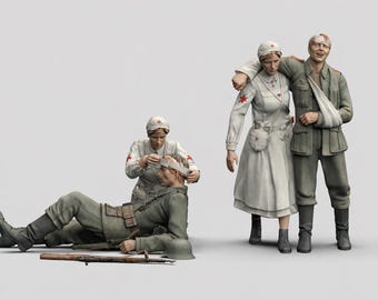 May include: A detailed miniature diorama depicting a World War I medical scene. A nurse in a white uniform with a red cross tends to a wounded soldier. Another soldier is supported by a nurse, and a third soldier lies on the ground.