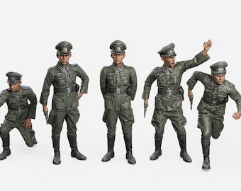 May include: A set of seven miniature figurines depicting soldiers in olive green uniforms, including peaked caps, tunics with medals, breeches, and tall black boots. Some figures are standing, one is kneeling, and others are in dynamic poses with pistols.