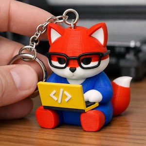Artisan Programmer Fox Keychain – Hand-Painted Multicolor 3D Character for Tech Lovers