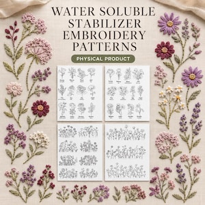 May include: Water soluble stabilizer embroidery patterns featuring four white sheets with black line art floral designs, surrounded by various colorful embroidered flower stems in shades of pink, purple, white, and green on fabric.
