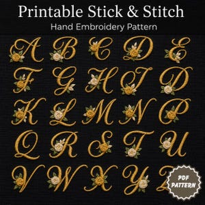 May include: A printable stick and stitch hand embroidery pattern featuring the alphabet in a gold cursive font. Each letter is decorated with small embroidered yellow and white roses and green leaves against a solid black background.