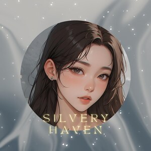 May include: Digital illustration of a woman with long brown hair, soft blush, and subtle makeup. She wears a small earring. The text "SILVERY HAVEN" is displayed in gold lettering below the portrait, set against a blurred, silvery background.