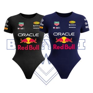 May include: Two bodysuits, one black and one navy blue, featuring the Red Bull Racing logo. The bodysuits have short sleeves and the Oracle and Red Bull logos are prominently displayed. Additional sponsor logos are also visible.