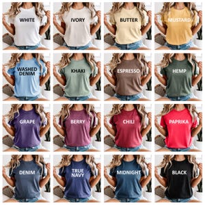 May include: A collection of short-sleeved t-shirts in various colors, each labeled with a color name in white text. Colors include white, ivory, butter, mustard, washed denim, khaki, espresso, hemp, grape, berry, chili, paprika, denim, true navy, midnight, and black.