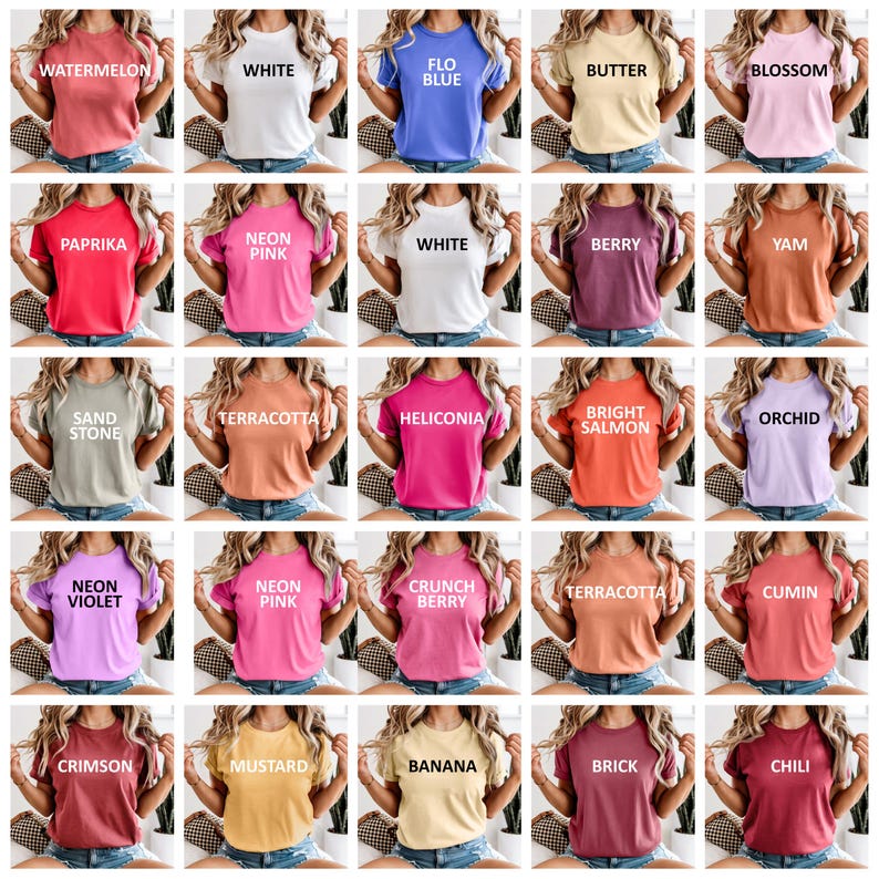 May include: A collection of colorful t-shirts in various shades, including watermelon, white, and blue. Each shirt features a different color name printed in white block letters. The shirts are short-sleeved and appear to be made of a soft material.