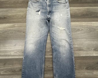 Jeans vintage Levi's 317 da uomo, taglia 34x30, lavaggio chiaro, effetto usurato, gamba svasata, etichetta arancione, Made in USA
