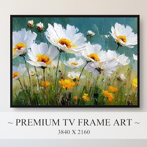 Può includere: Dipinto floreale incorniciato con margherite bianche con centri gialli e piccoli fiori gialli su uno sfondo verde e turchese. L'opera d'arte è in una cornice nera ed è etichettata come "PREMIUM TV FRAME ART".