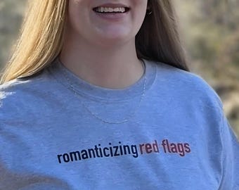 Romanticizing red flags tee