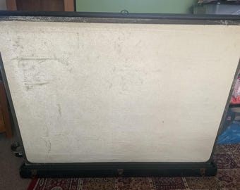 Antique projector screen. Pop up in hard case. signs of wear. Silvery sheen