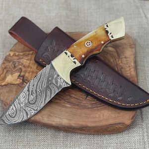 May include: A white ceramic mug with a black handle and the text "But First, Coffee" in a bold, black font. The mug is likely 11-15 ounces in size, perfect for a morning beverage.