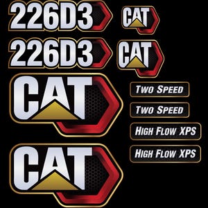 May include: A collection of black, red, gold, and white CAT decals. The decals include the text "226D3", "CAT", "TWO SPEED", and "HIGH FLOW XPS". The CAT logo features a yellow triangle.