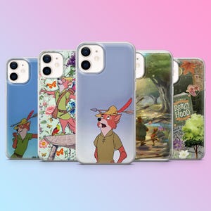 Peut inclure: Plusieurs coques de téléphone avec des motifs du film d'animation "Robin des Bois". Les coques présentent des images de Robin des Bois, des scènes du film et des motifs floraux. Conçues pour s'adapter à un smartphone.
