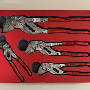 May include: A set of Knipex pliers in a red box. The pliers have silver jaws and red handles. The box is red and contains five pliers. The pliers are arranged in a neat, organized manner, suggesting a tool kit or set.