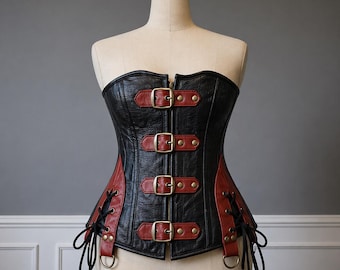 Top tipo corsé sin tirantes con hebilla, estilo bustier gótico, ideal para fiestas.