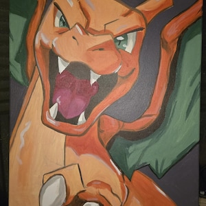 May include: A canvas painting featuring a stylized orange dragon-like creature with a wide-open mouth, sharp white teeth, and a purple tongue. The creature has large green wings, a cream-colored underbelly, and is set against a dark gray background.