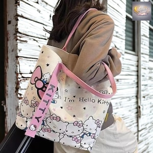 Sanrio Hello cartoon axelväska med stor kapacitet, kawaii canvas anime-toteväska, skolväska från Y2K, söt tecknad kattpresent till flickor,