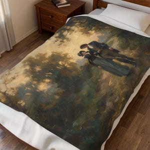 May include: A bed throw featuring a classical painting of a couple in a forest setting. The artwork depicts a man and woman in period clothing, surrounded by trees and a soft, golden light. The throw is displayed on a bed.