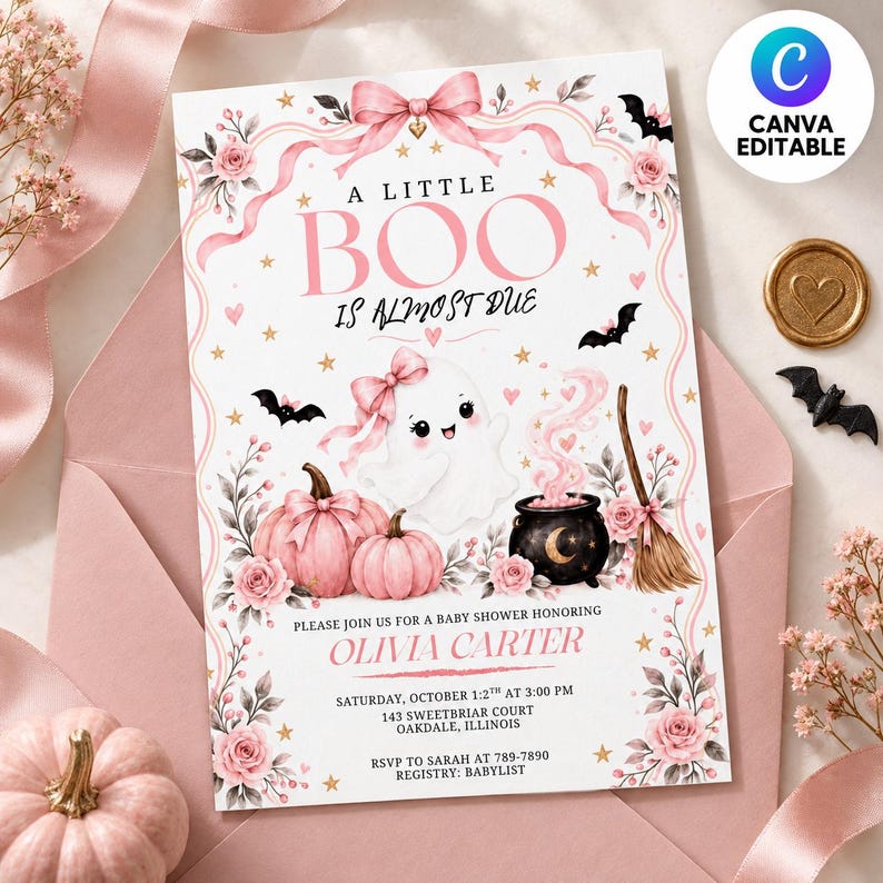 May include: A baby shower invitation card featuring a white background with pink floral borders, a pink bow, bats, two pink pumpkins, a ghost with a pink bow, a black cauldron with pink smoke, and a broom. Text reads A LITTLE BOO IS ALMOST DUE.