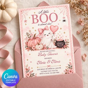 May include: A rectangular baby shower invitation card featuring a pink and cream color palette with a ghost wearing a plaid bow, a heart-shaped balloon, pumpkins, and a cauldron. The text reads A little BOO is almost due, Baby Shower, Olivia & Oliver.