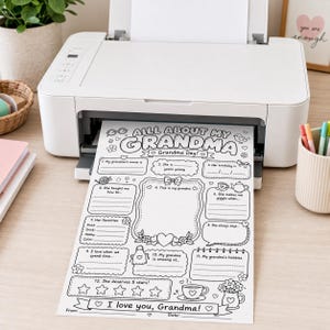 May include: A white printer outputting a black and white printable activity sheet titled All About My Grandma. The sheet features eleven fill-in-the-blank sections, a large central frame for a drawing, and a five-star rating area for Grandma.