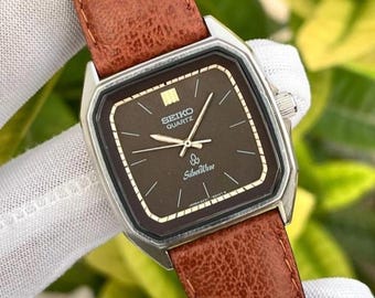 Vintage Seiko Silver Wave Chocolate Textured Japan Men's Quartz Watch 8221-5010