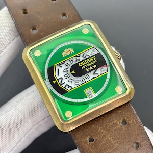 Vintage Orient 3 Star Rotating Disc Jump Hour Style Auto Japan Men Watch ERAM-AO