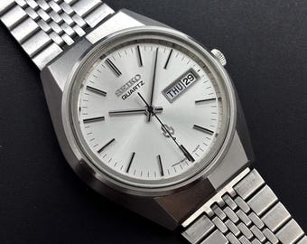 Montre à quartz originale japonaise Seiko 3803-7020 pour homme avec cadran argenté soleillé