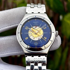 Swatch "Midday Sun" Skelett Automatisk YAS409G Schweizisk Herrklocka Kal. 2824