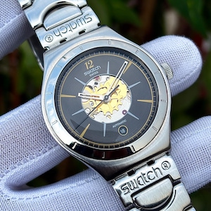 Swatch "Dark Sky" Skelett Automatisk YAS407G Schweizisk Herrklocka Kal. 2842