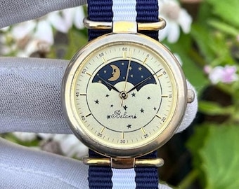 Reloj de cuarzo para hombre Belami vintage raro con fase solar y lunar, esfera con estrellas brillantes, fabricado en Japón.