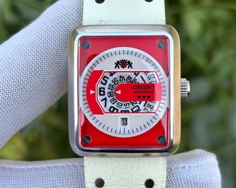 Vintage Orient Automatic Rotating Disc Jump Hour Style Japan UNISEX Watch NRAK-CO